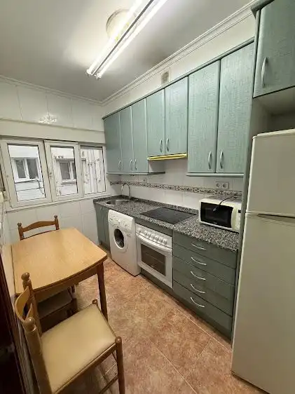 Kitchen of Flat for rent in Gijón   with Heating and Balcony