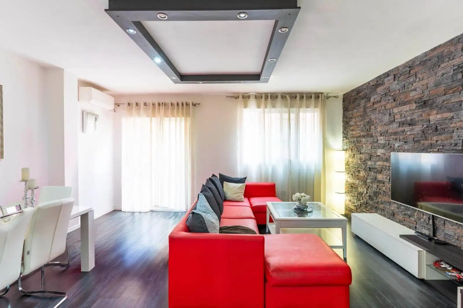 Sala de estar de Casa adosada en venta en Roquetas de Mar con Aire acondicionado y Terraza