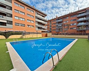 Swimming pool of Flat for sale in Castelldefels  with Air Conditioner, Heating and Parquet flooring