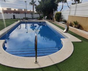 Swimming pool of Single-family semi-detached for sale in Creixell  with Air Conditioner, Terrace and Swimming Pool