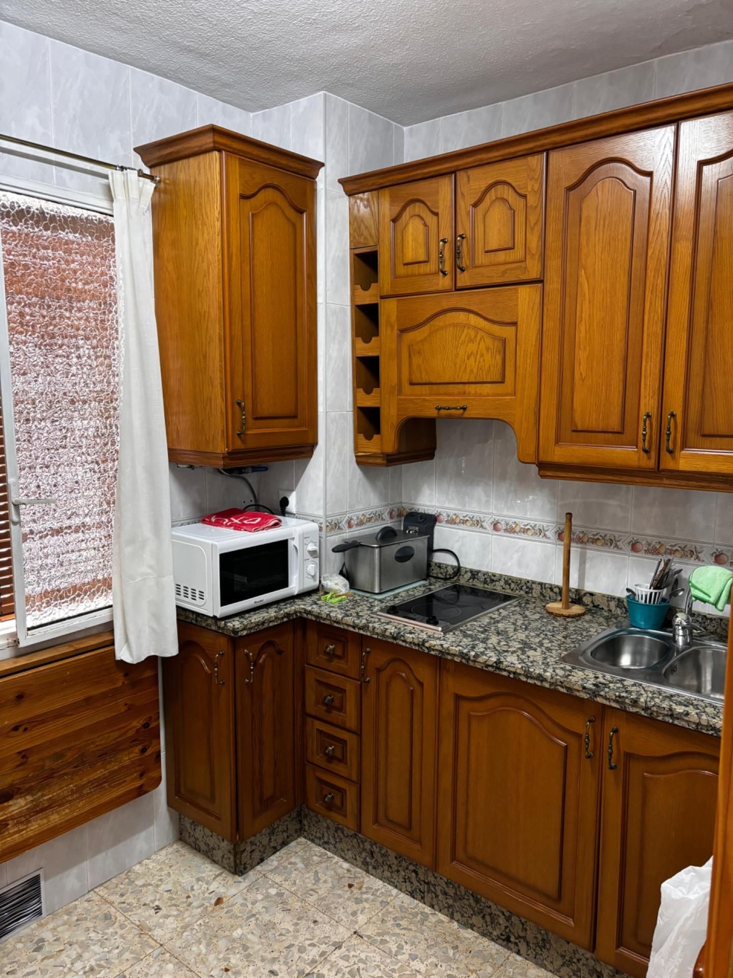 Kitchen of Flat to rent in  Córdoba Capital  with Air Conditioner and Private garden