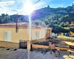 Exterior view of Single-family semi-detached for sale in Monistrol de Montserrat  with Air Conditioner, Heating and Terrace