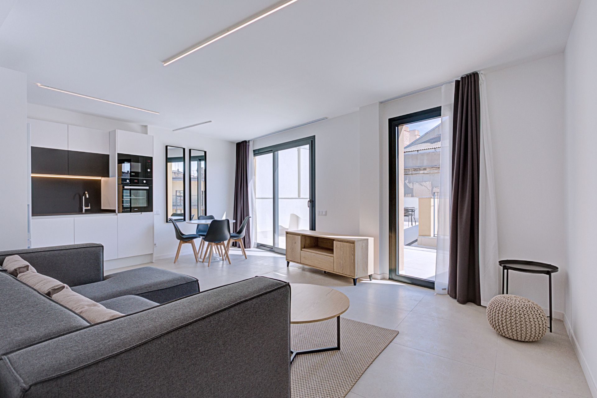 Sala d'estar de Àtic de lloguer en  Barcelona Capital amb Aire condicionat, Terrassa i Moblat
