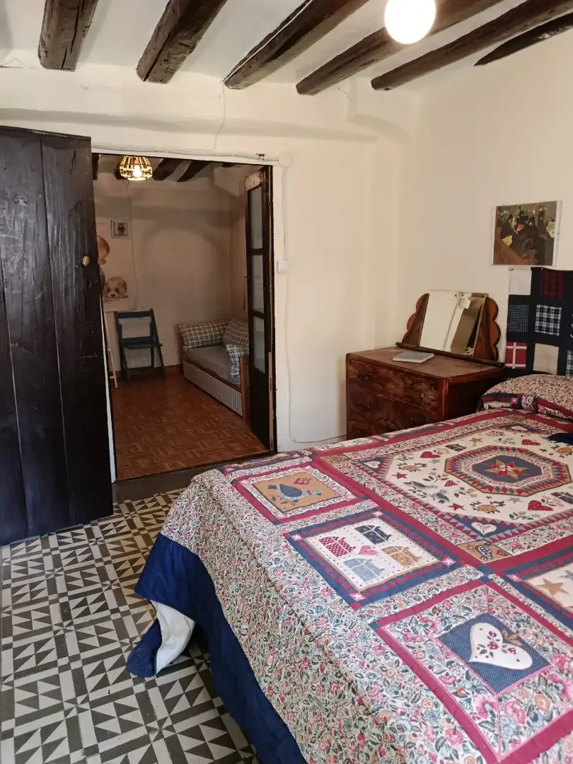Habitación de Casa adosada en venta en Munilla con Trastero, Amueblado y Balcón