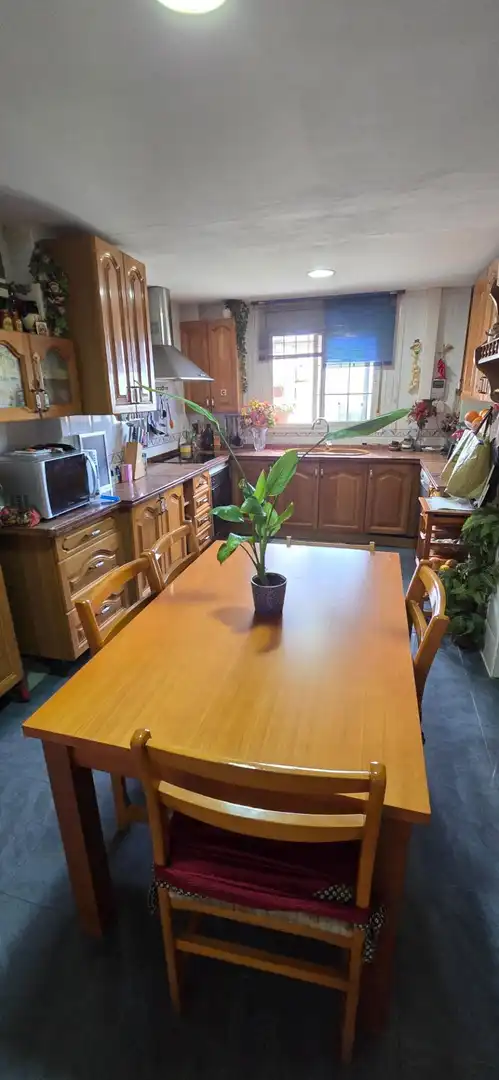 Menjador de Casa adosada en venda en Málaga amb Aire condicionat, Calefacció i Jardí privat