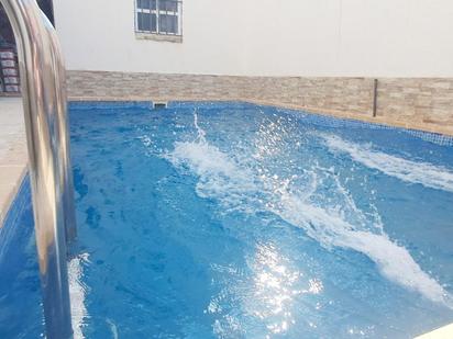 Swimming pool of Single-family semi-detached for sale in Utrera  with Air Conditioner, Storage room and Swimming Pool