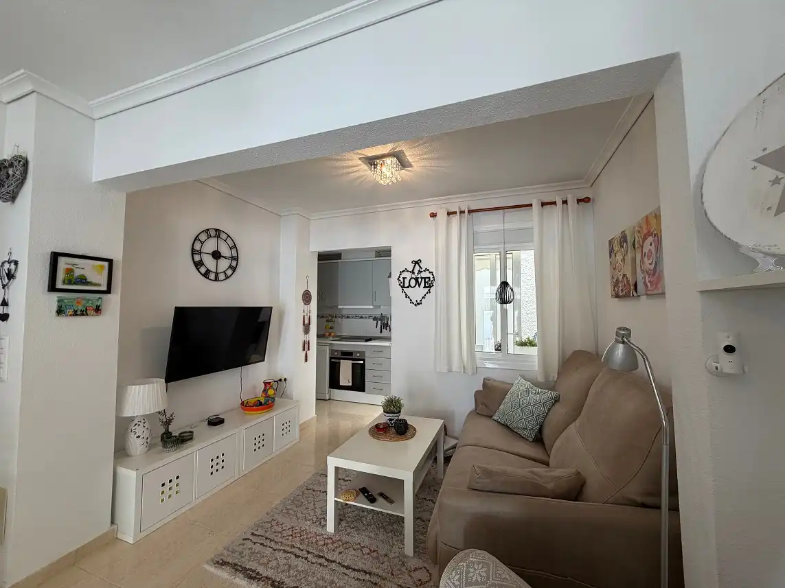 Sala de estar de Casa adosada en venta en Santa Pola con Aire acondicionado, Terraza y Amueblado