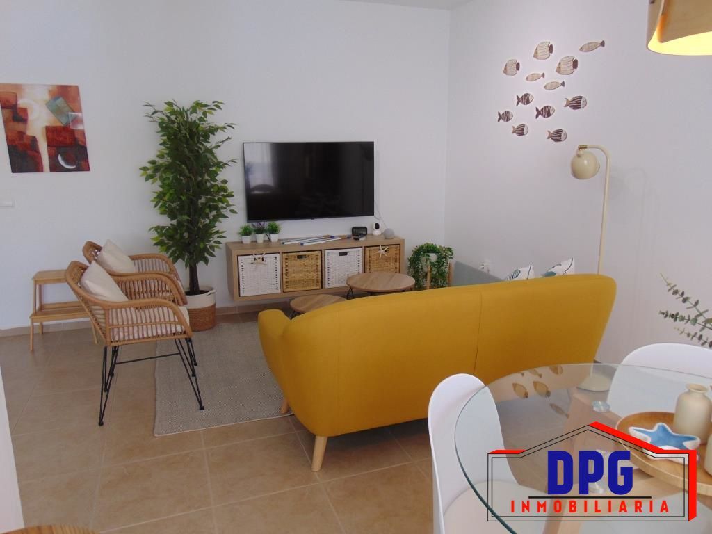 Sala d'estar de Apartament de lloguer en Garrucha amb Aire condicionat i Terrassa