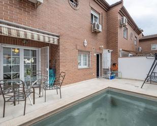 Swimming pool of Single-family semi-detached for sale in  Granada Capital  with Air Conditioner, Heating and Private garden