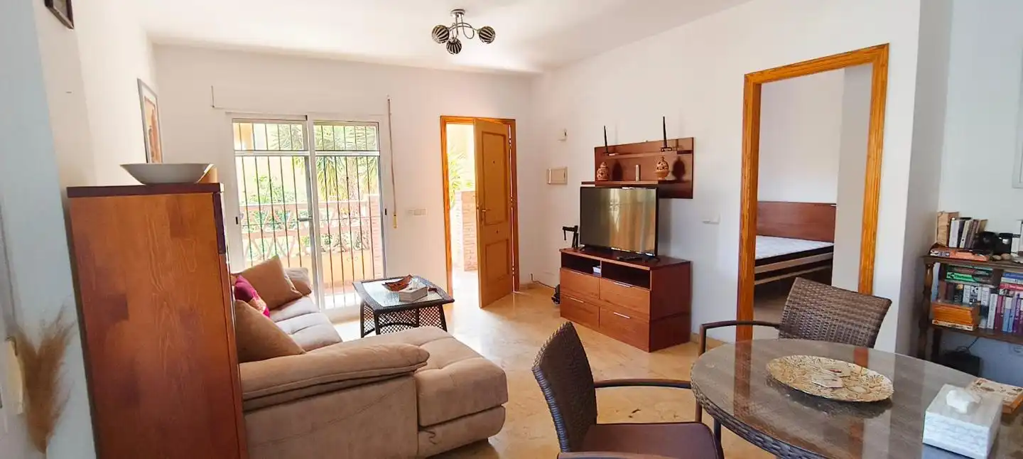 Sala d'estar de Planta baixa en venda en Vera amb Aire condicionat, Jardí privat i Terrassa