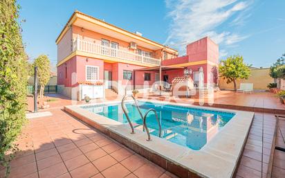 Exterior view of House or chalet for sale in Dos Hermanas  with Air Conditioner, Terrace and Swimming Pool