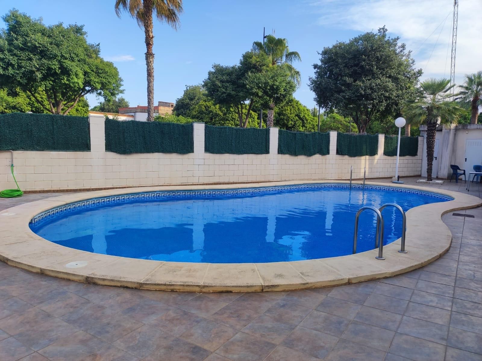 Piscina de Casa adosada de lloguer en Gandia