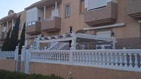 Exterior view of Single-family semi-detached for sale in  Almería Capital  with Terrace and Swimming Pool