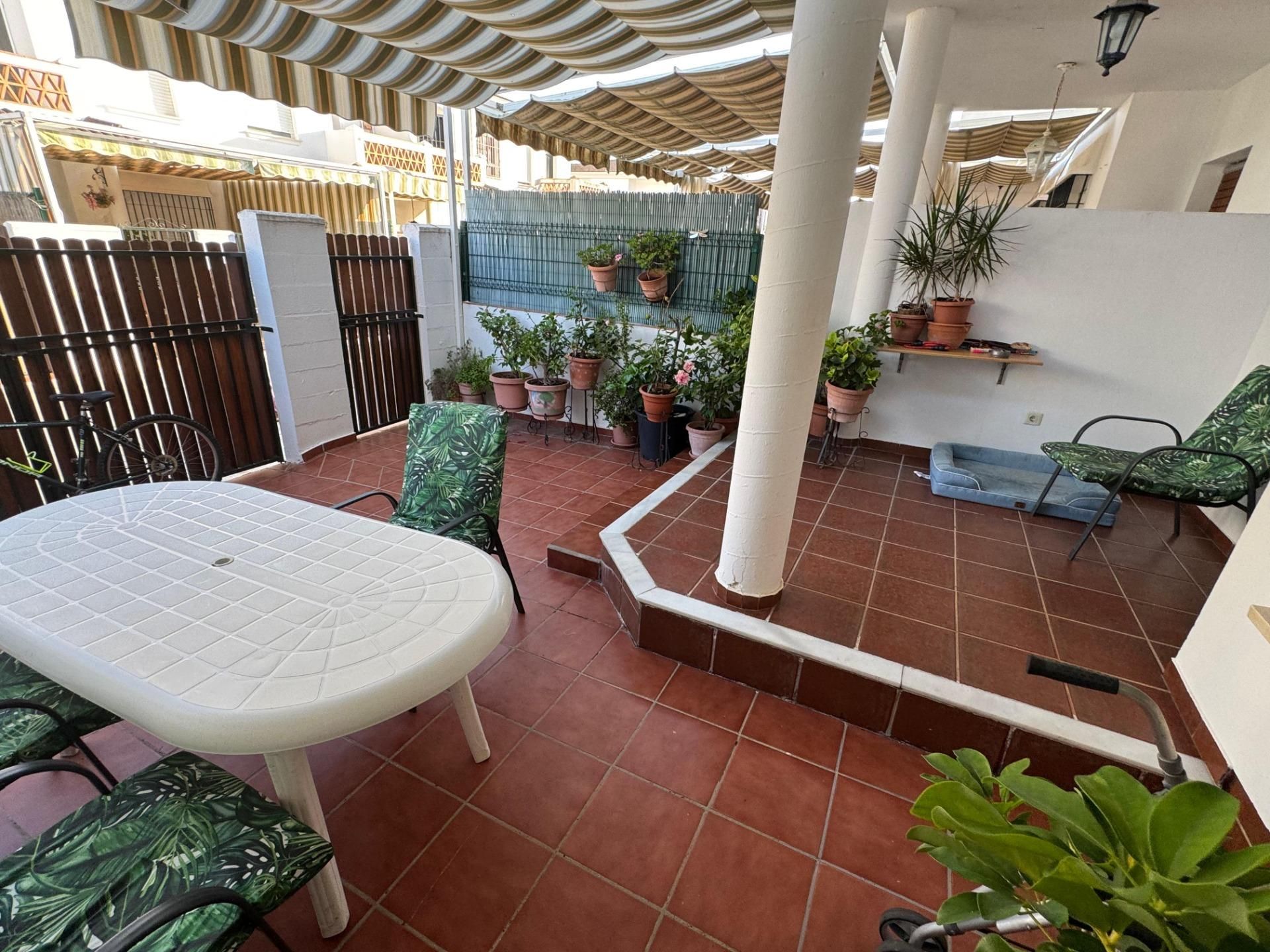 Terrassa de Casa adosada en venda en El Portil amb Terrassa i Piscina comunitària