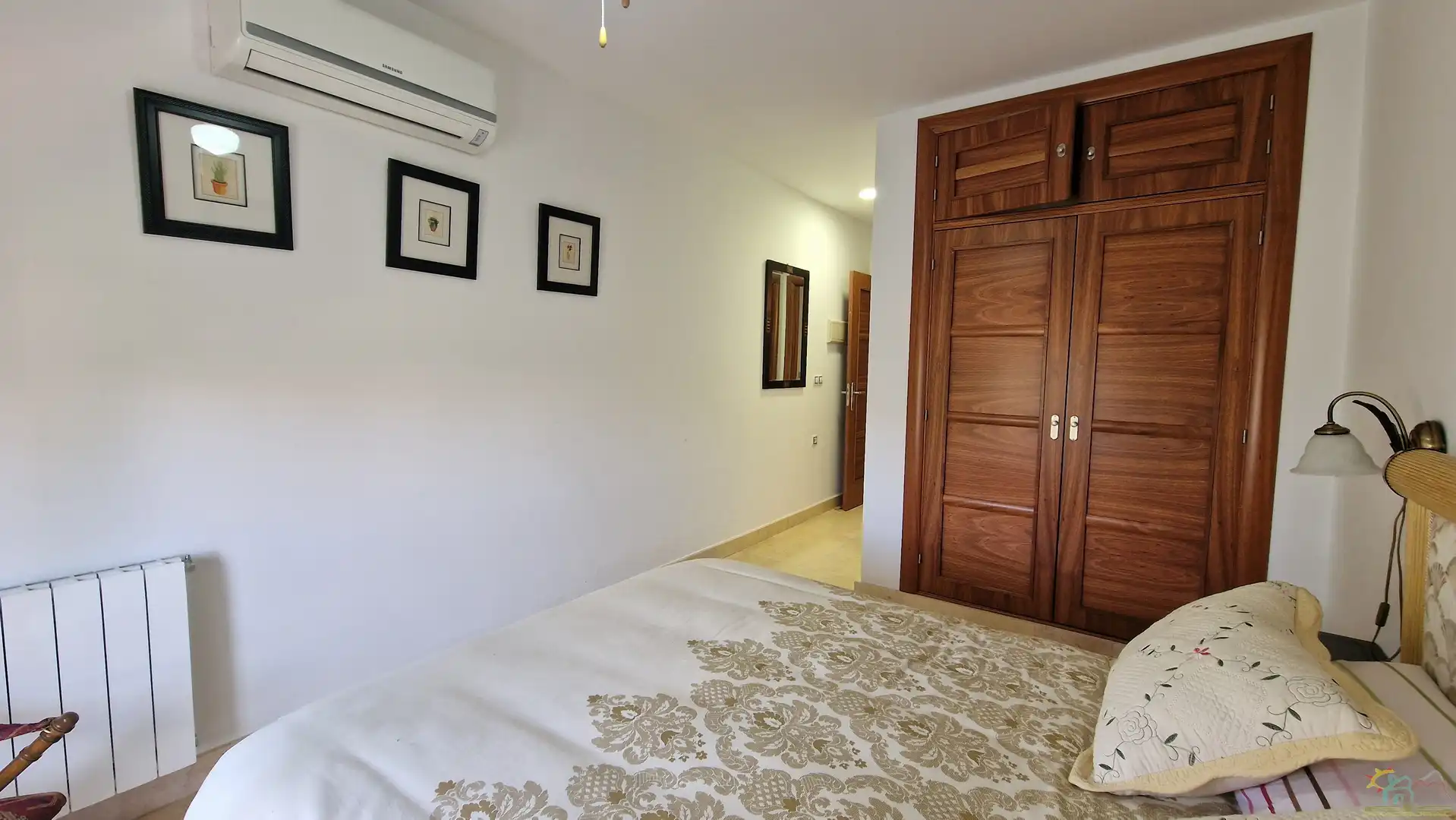 Schlafzimmer von Einfamilien-Reihenhaus zum Verkauf in Diezma mit Klimaanlage, Heizung und Privatgarten