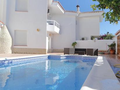 Swimming pool of Single-family semi-detached for sale in Torrox  with Air Conditioner, Terrace and Swimming Pool