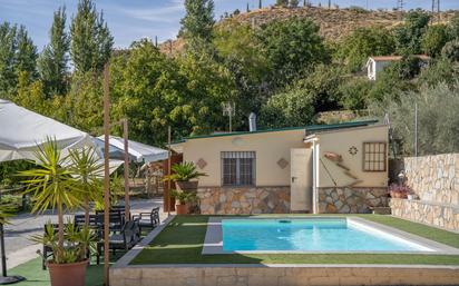 Piscina de Finca rústica en venda en Huétor Vega amb Aire condicionat, Jardí privat i Terrassa