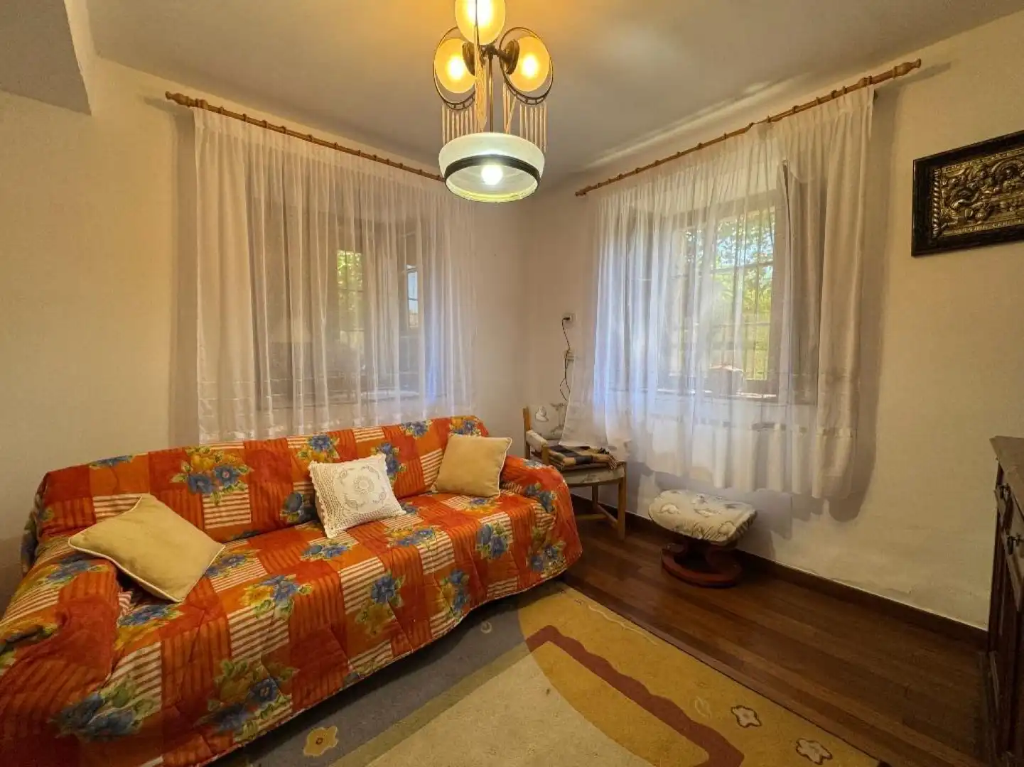 Sala d'estar de Casa adosada en venda en Molledo