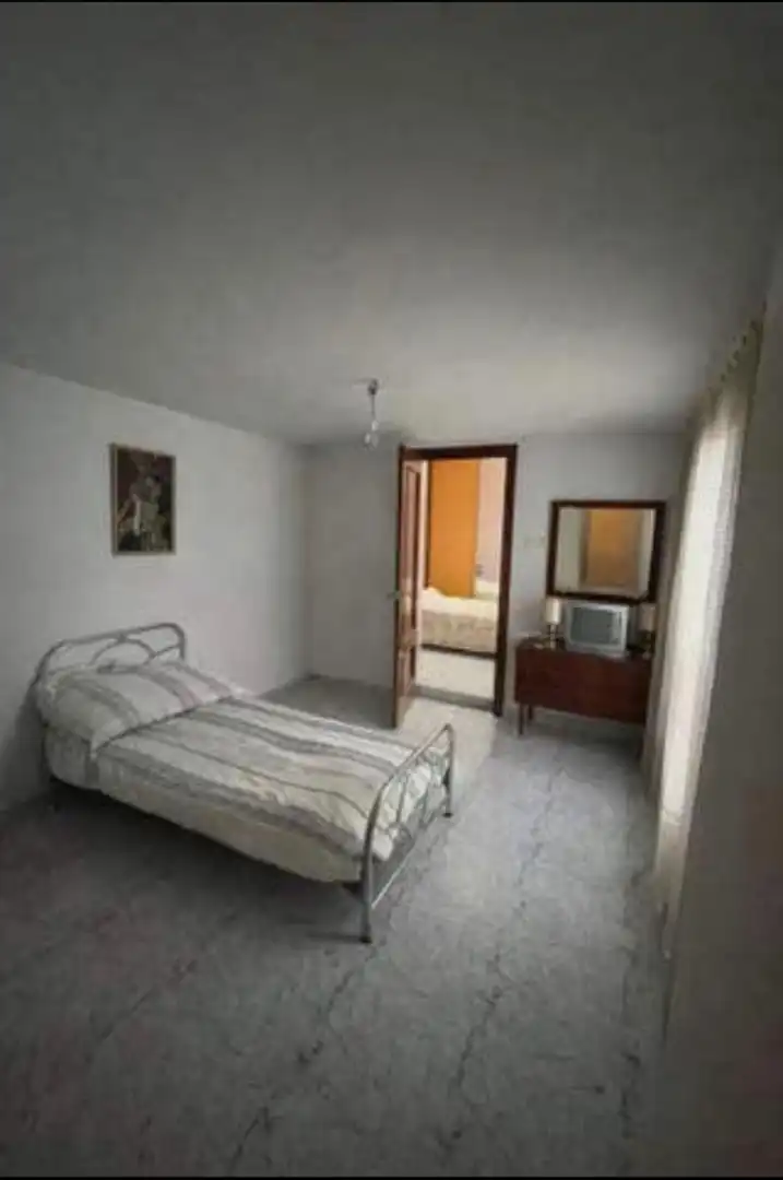 Habitación de Casa adosada en venta en Jaén con Aire acondicionado, Jardín privado y Balcón