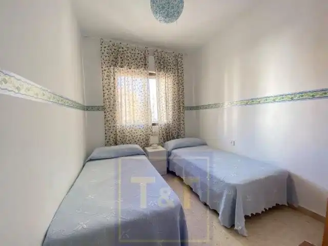 Dormitori de Apartament de lloguer en La Antilla amb Terrassa i Moblat