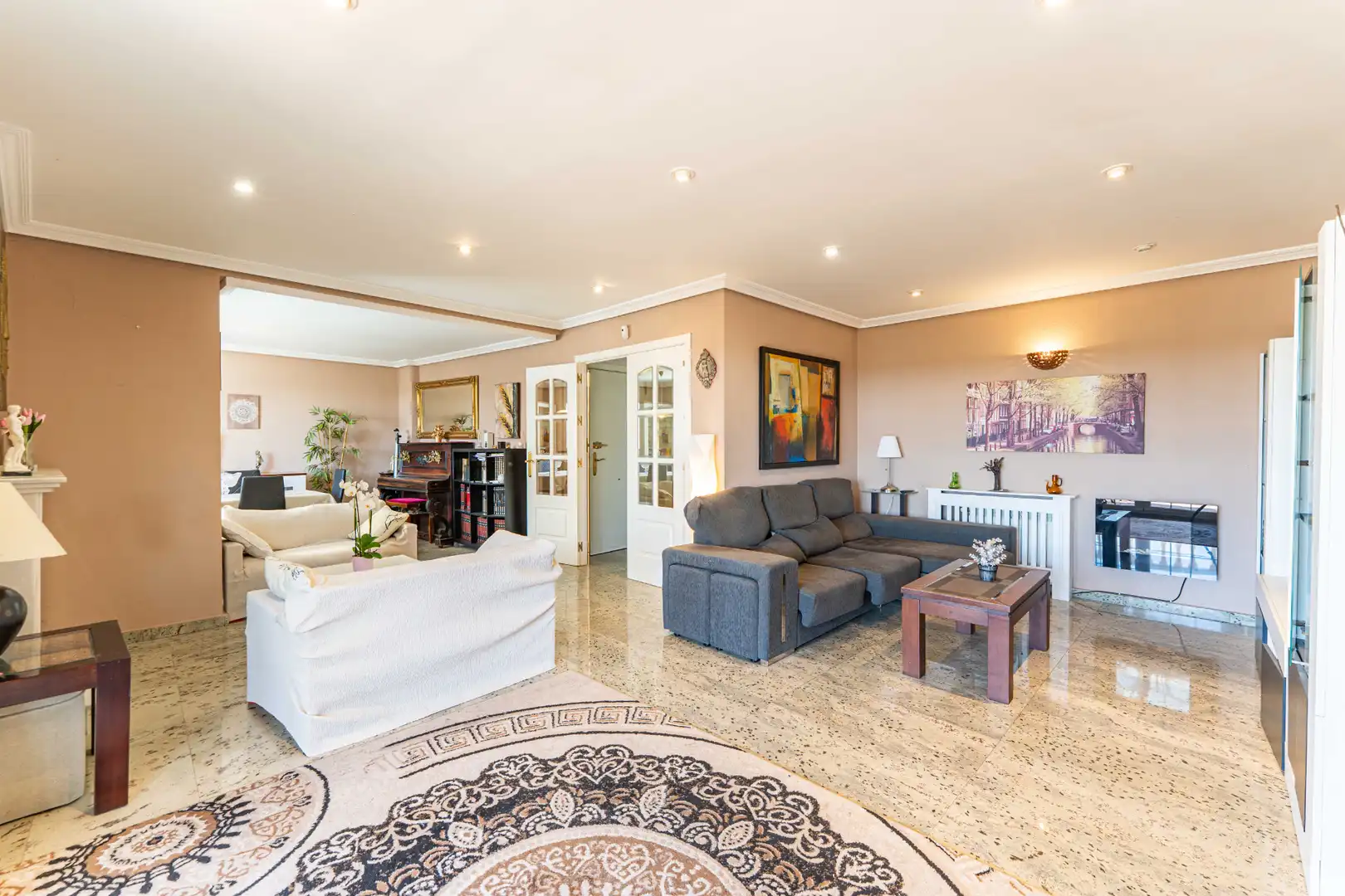 Sala de estar de Casa adosada en venta en Torrelodones con Calefacción, Jardín privado y Terraza