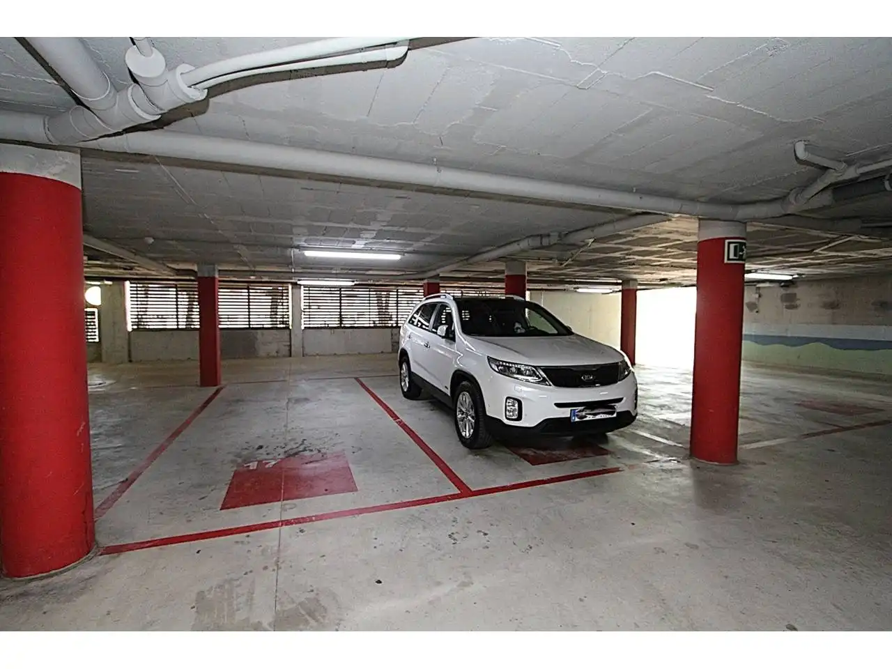 Parkplatz von Wohnung zum Verkauf in Lloret de Mar mit Klimaanlage, Heizung und Privatgarten