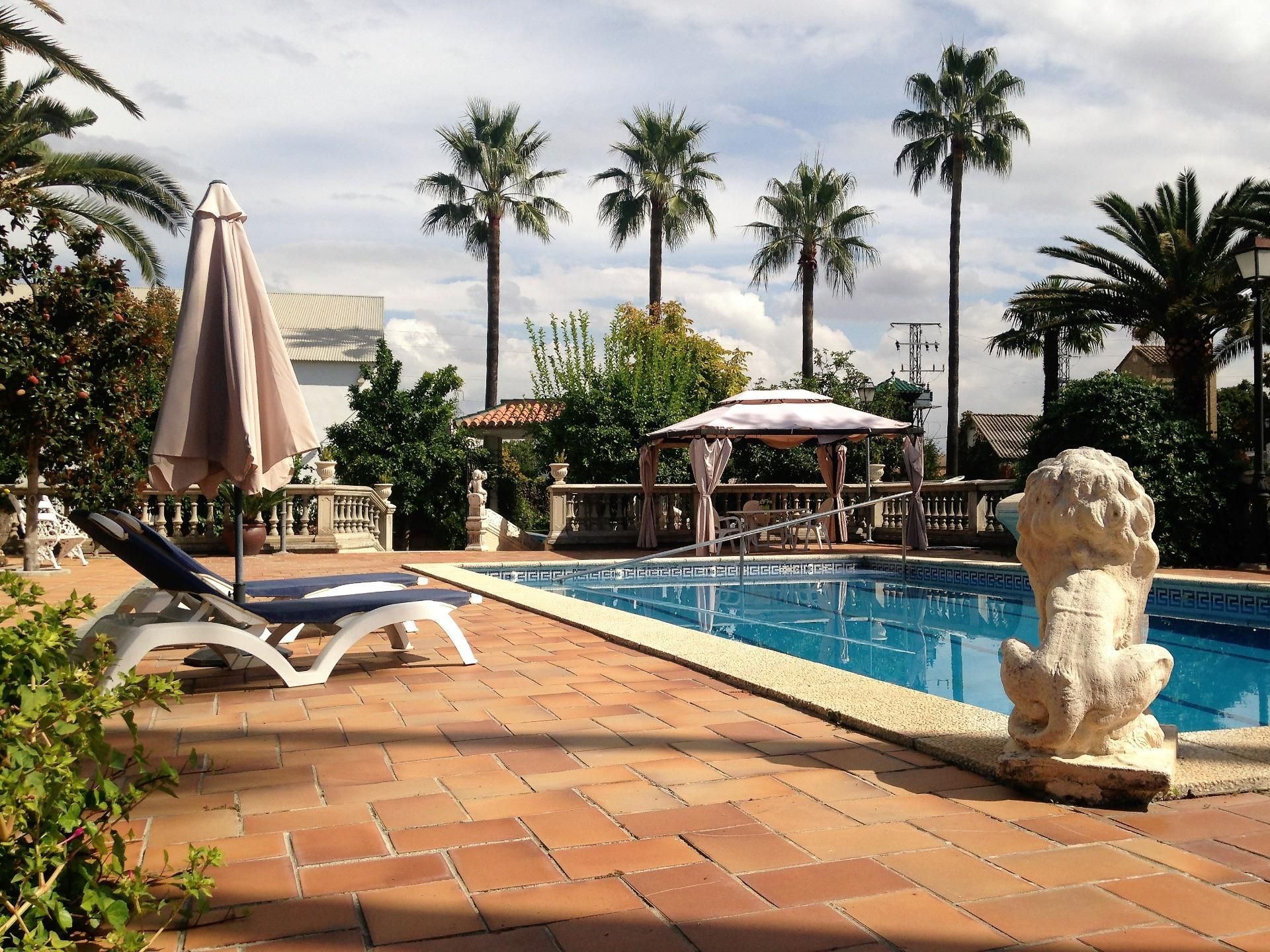 Swimming pool of Country house for sale in Cúllar Vega  with Air Conditioner, Heating and Private garden