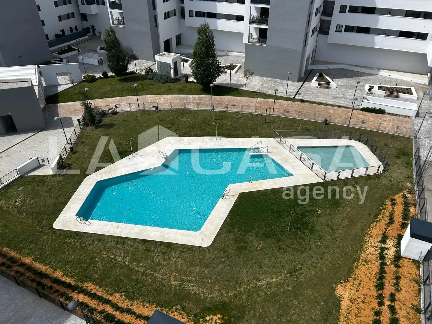 Swimming pool of Flat for sale in Dos Hermanas  with Air Conditioner, Terrace and Swimming Pool