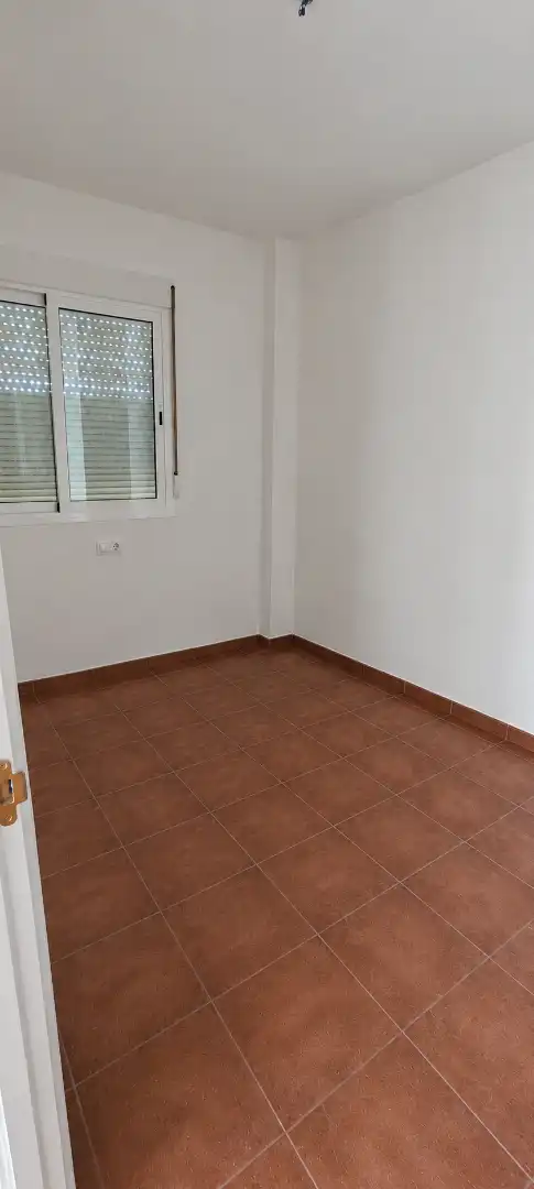 Habitación de Casa adosada en venta en La Carlota con Aire acondicionado, Calefacción y Horno