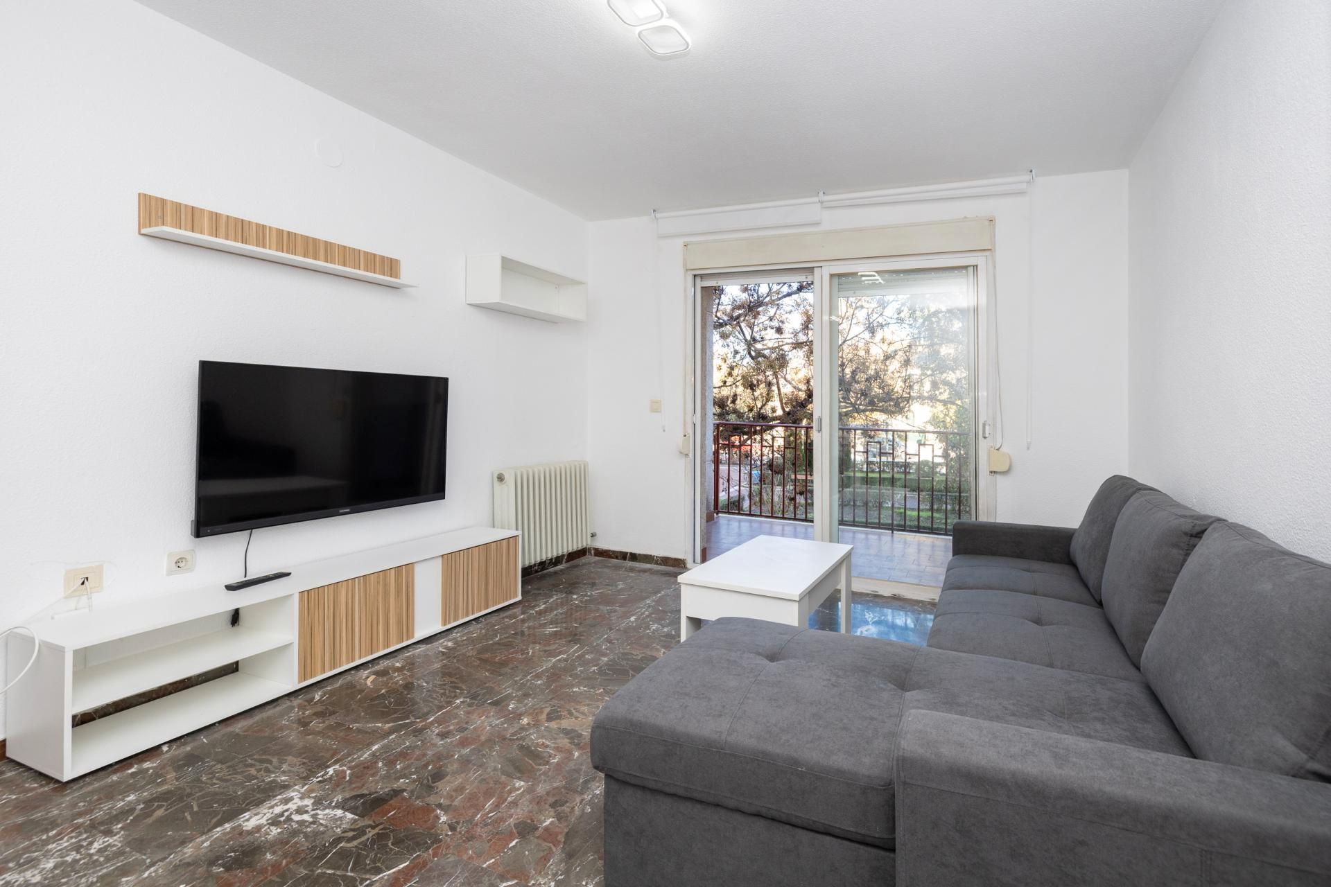 Living room of Apartment for sale in  Granada Capital  with Alarm