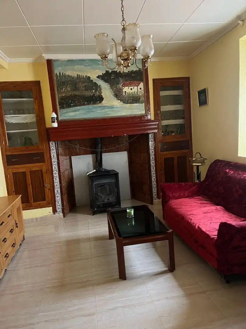 Sala d'estar de Casa adosada en venda en Teresa de Cofrentes amb Calefacció
