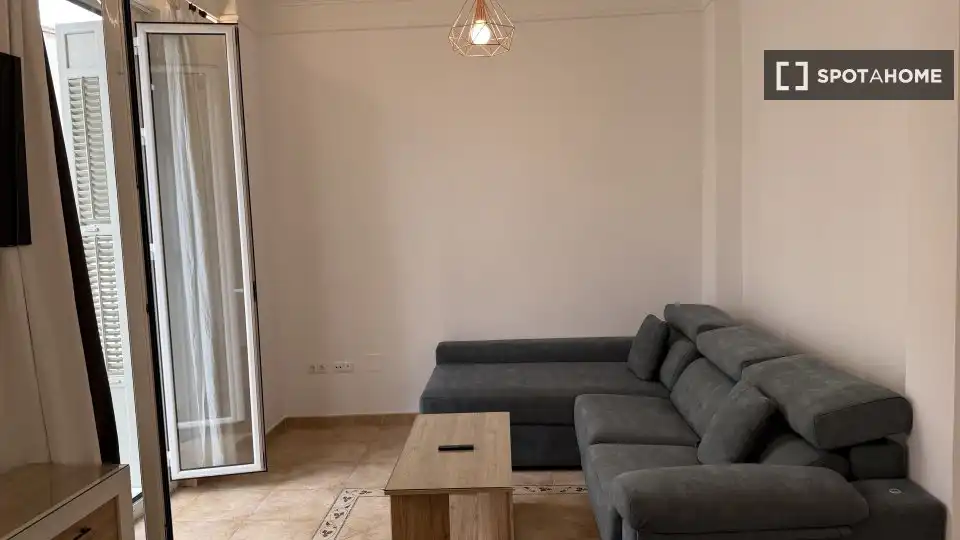 Sala d'estar de Apartament per a compartir en Málaga amb Aire condicionat, Terrassa i Moblat