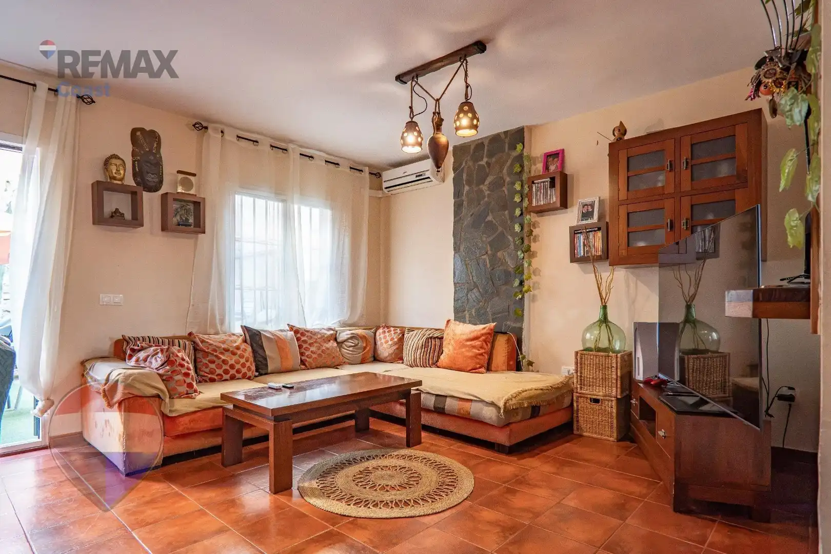 Sala d'estar de Casa adosada en venda en Cártama amb Piscina comunitària
