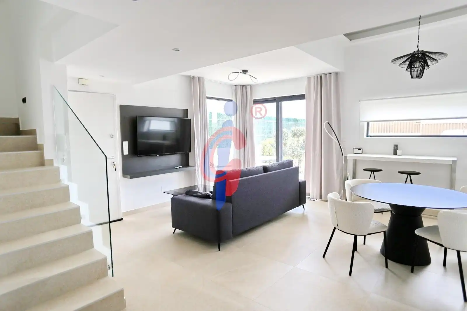 Sala d'estar de Casa adosada en venda en Guardamar del Segura amb Aire condicionat, Jardí privat i Terrassa
