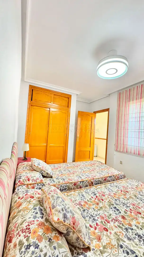 Dormitori de Casa adosada en venda en Orihuela amb Jardí privat, Terrassa i Piscina comunitària