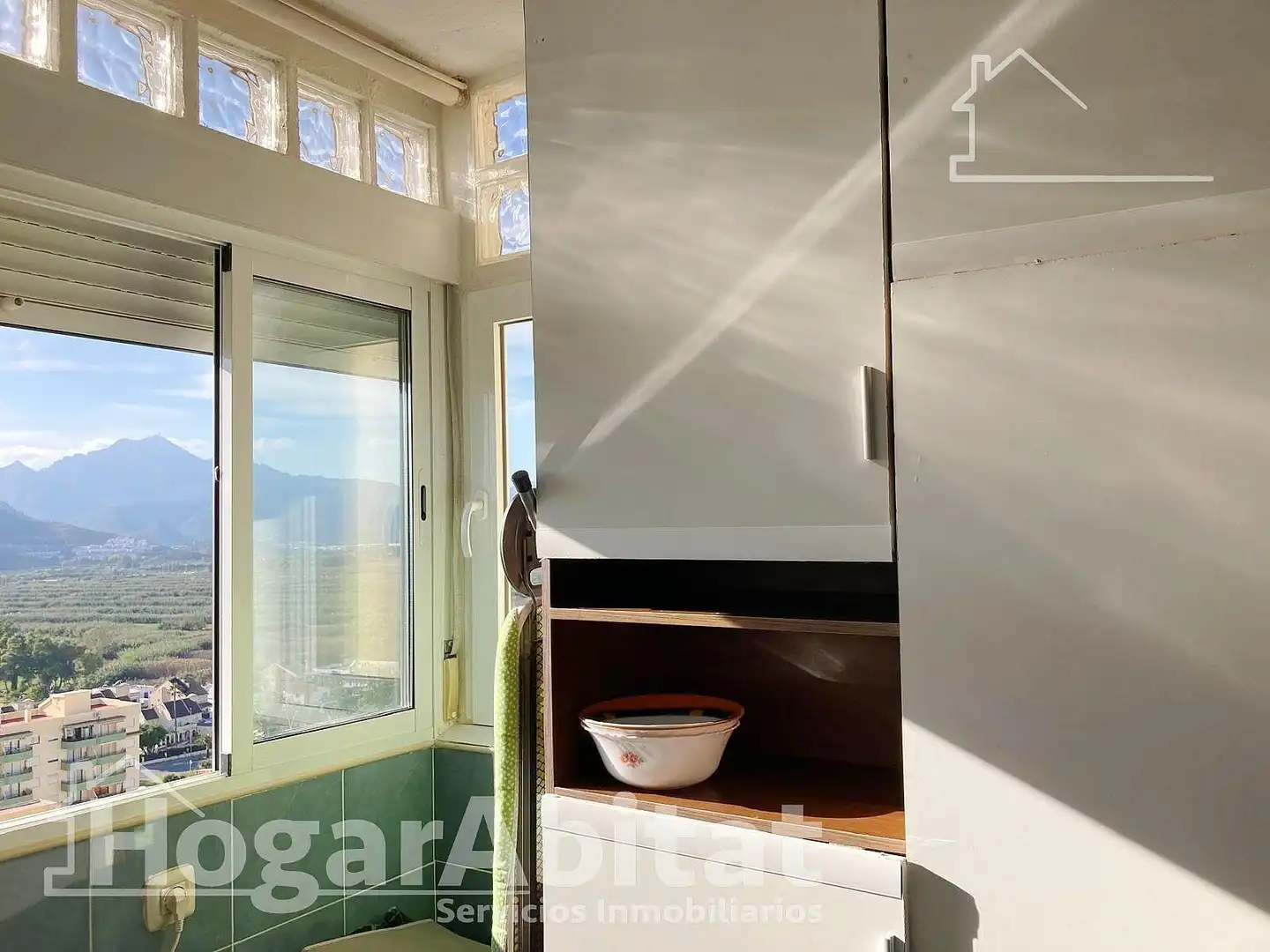 Kitchen of Flat for sale in Gandia  with Air Conditioner, Private garden and Community pool