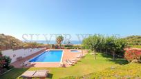 Swimming pool of Single-family semi-detached for sale in Castelldefels  with Air Conditioner and Terrace