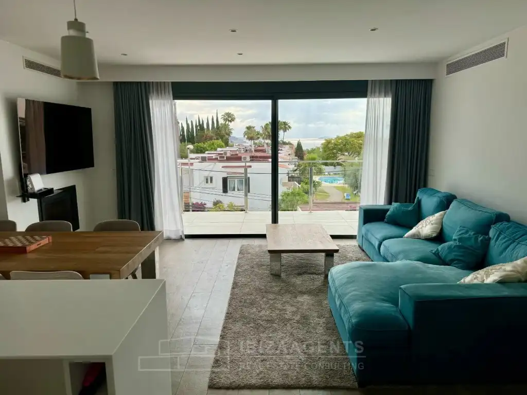 Sala de estar de Apartamento en venta en Santa Eulària des Riu con Aire acondicionado, Calefacción y Piscina