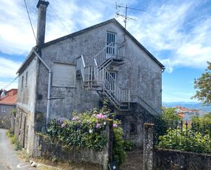 Vista exterior de Casa o xalet en venda en A Cañiza   amb Jardí privat, Traster i Moblat