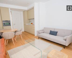 Living room of Flat to rent in  Madrid Capital  with Air Conditioner, Heating and Furnished