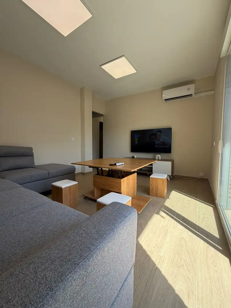 Living room of Flat for sale in Punta Umbría  with Air Conditioner, Heating and Parquet flooring