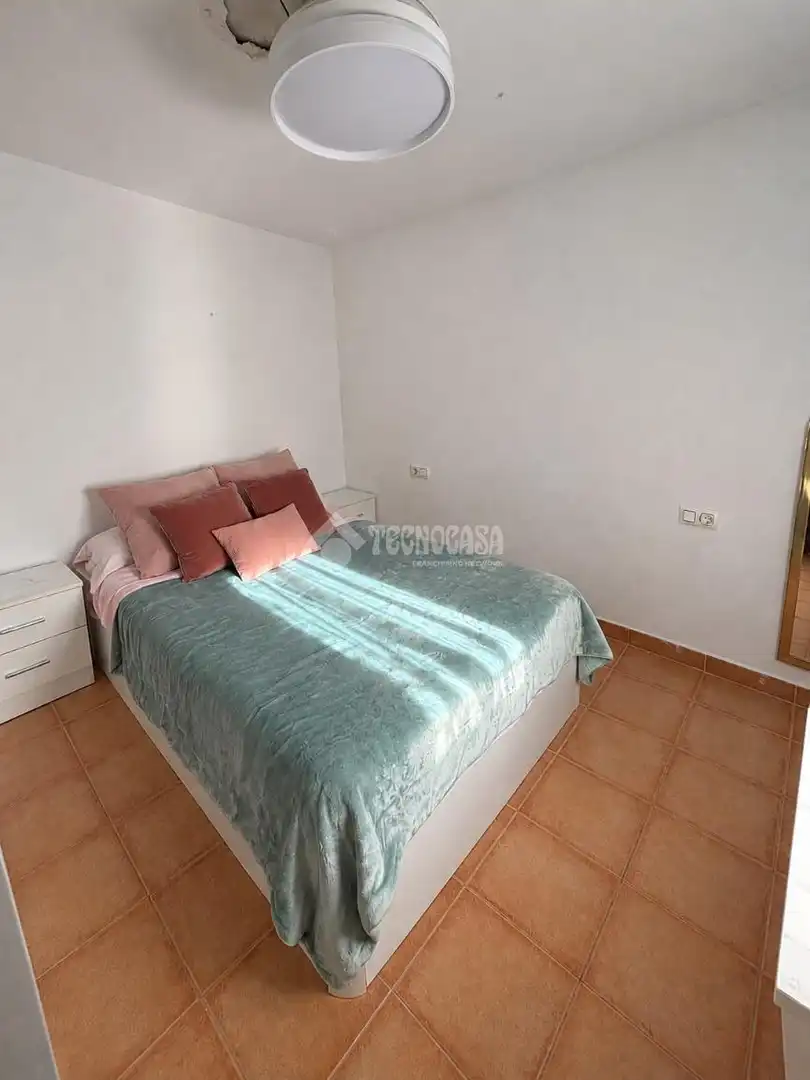 Habitación de Casa adosada en venta en Ayamonte con Aire acondicionado y Terraza