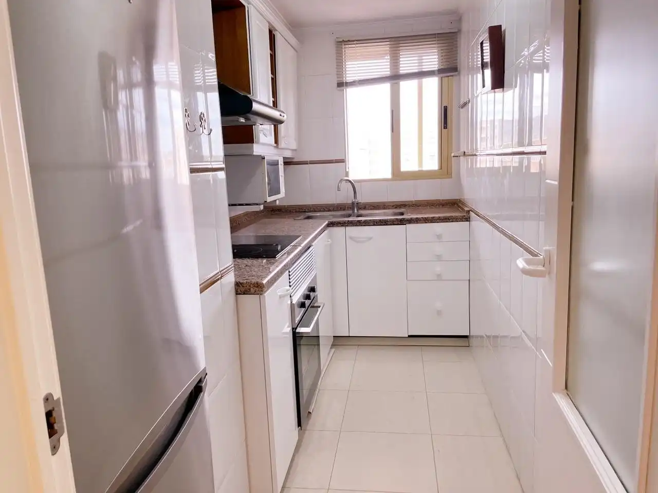 Cocina de Apartamento de alquiler en Benicasim / Benicàssim con Jardín privado, Terraza y Amueblado