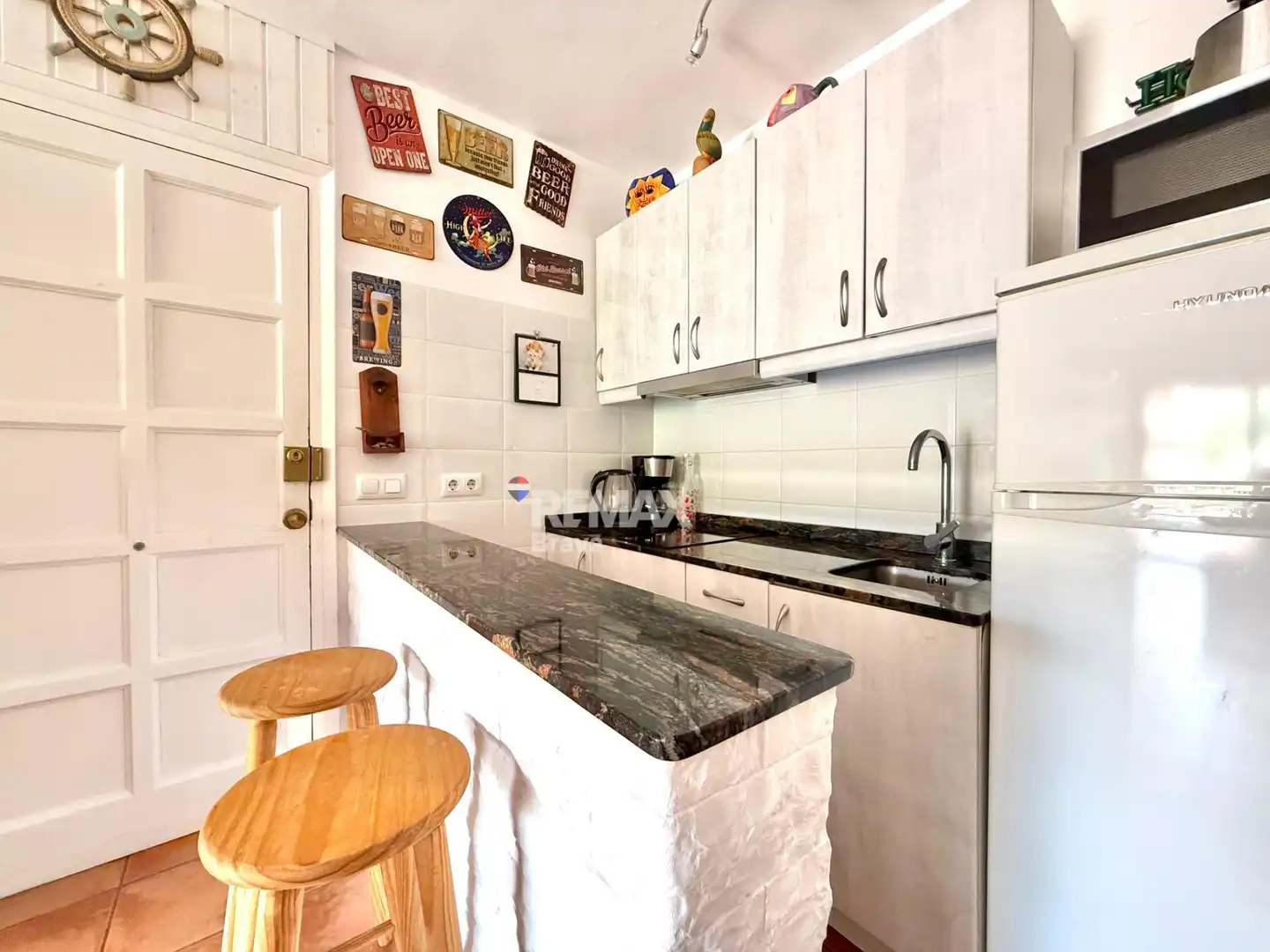Cuina de Apartament en venda en Tossa de Mar amb Jardí privat, Balcó i Piscina comunitària