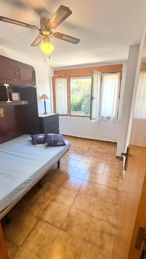 Dormitori de Casa adosada en venda en Orihuela amb Jardí privat, Terrassa i Traster