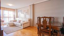 Living room of Flat for sale in Gijón   with Heating, Storage room and Swimming Pool