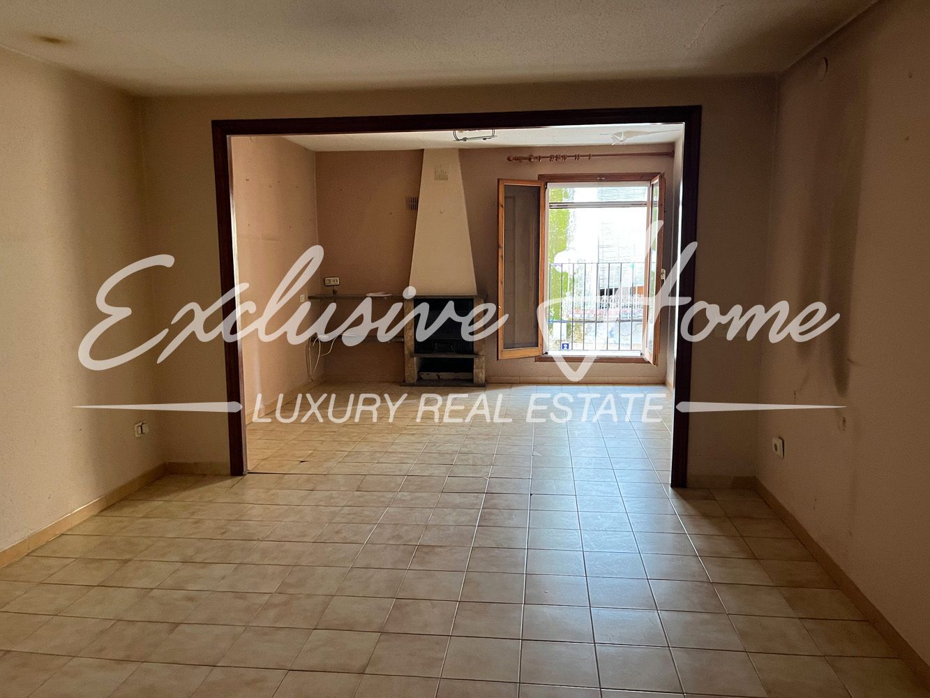 Sala d'estar de Casa adosada en venda en Santa Magdalena de Pulpis amb Traster i Moblat