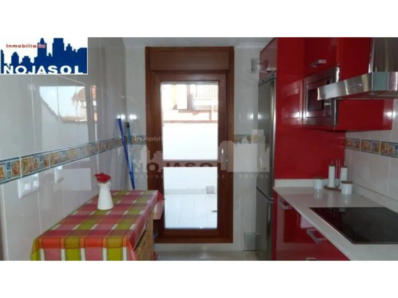 Cuina de Àtic de lloguer en Noja amb Calefacció, Terrassa i Moblat