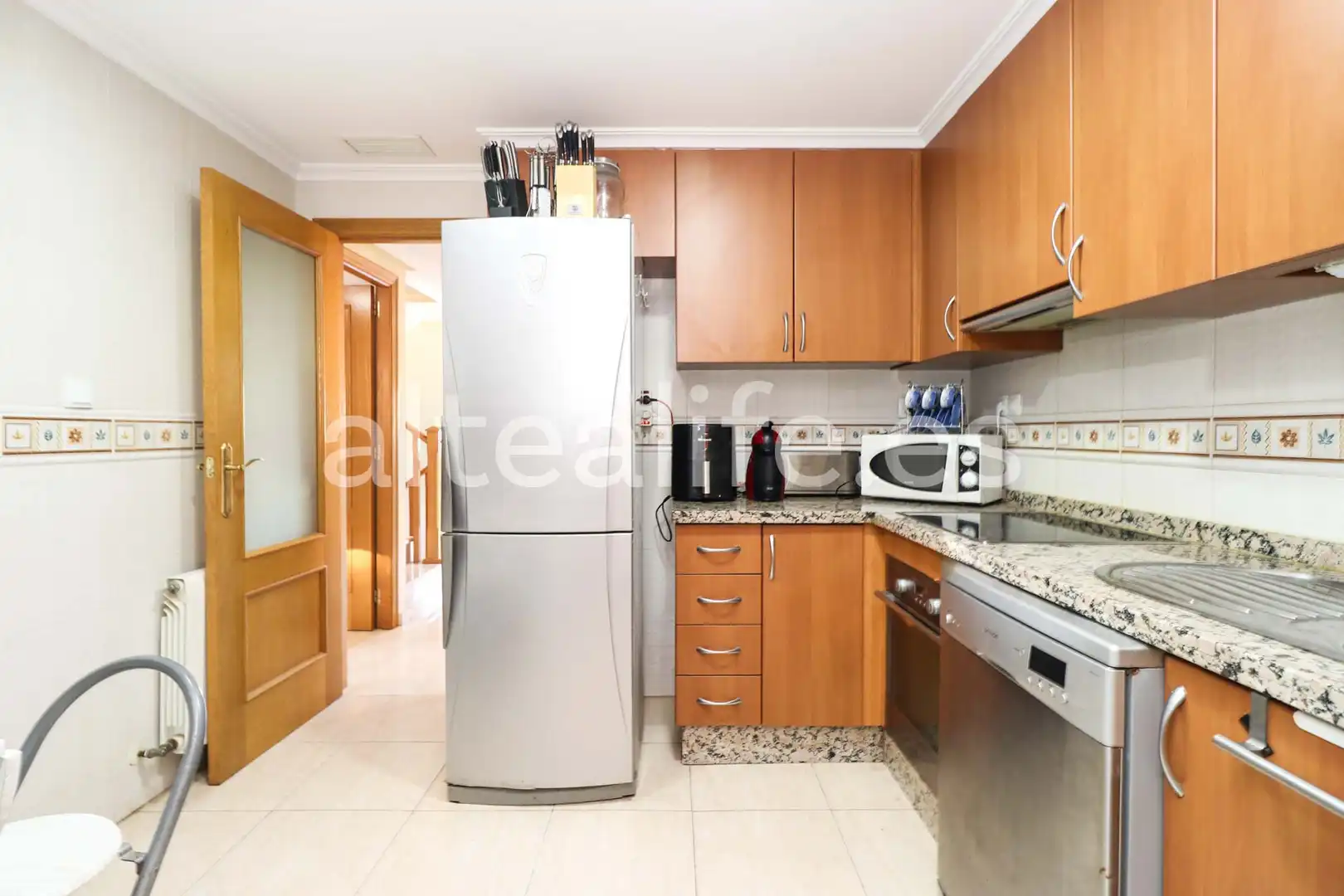 Cocina de Casa adosada en venta en La Nucia con Calefacción, Terraza y Piscina comunitaria