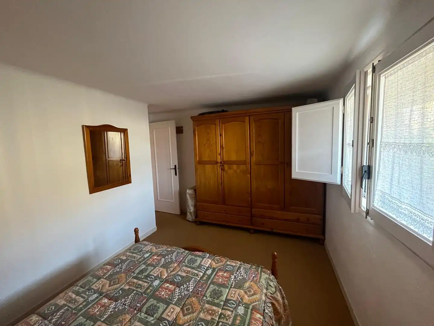 Habitación de Apartamento de alquiler en Castell d'Aro, Platja d'Aro i s'Agaró con Aire acondicionado, Jardín privado y Terraza